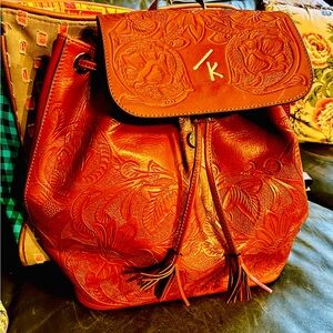 Tooled  Branded Embossed Leather Backpack